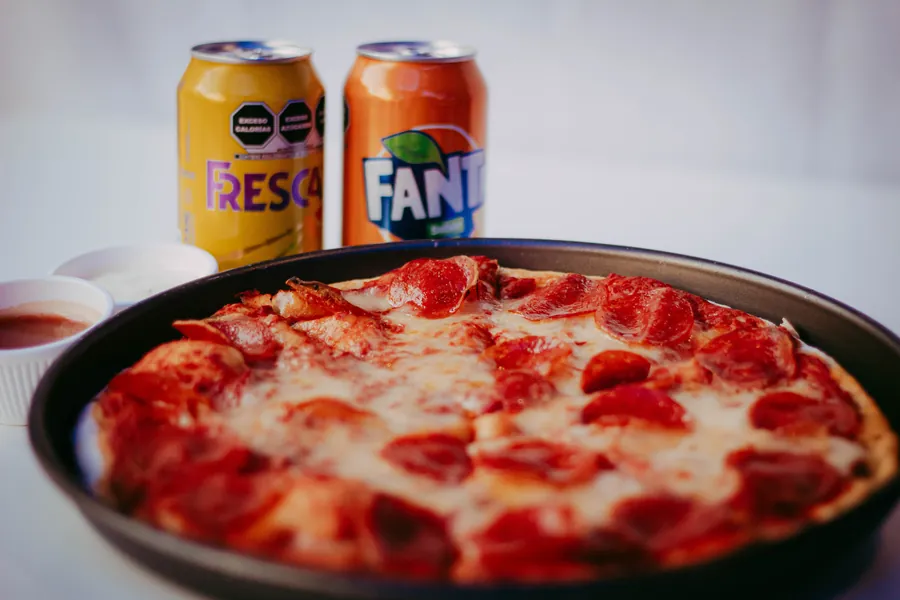 Pizza familiar + refresco 2 L